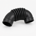 Generic automotive air intake hose on a clean studio background