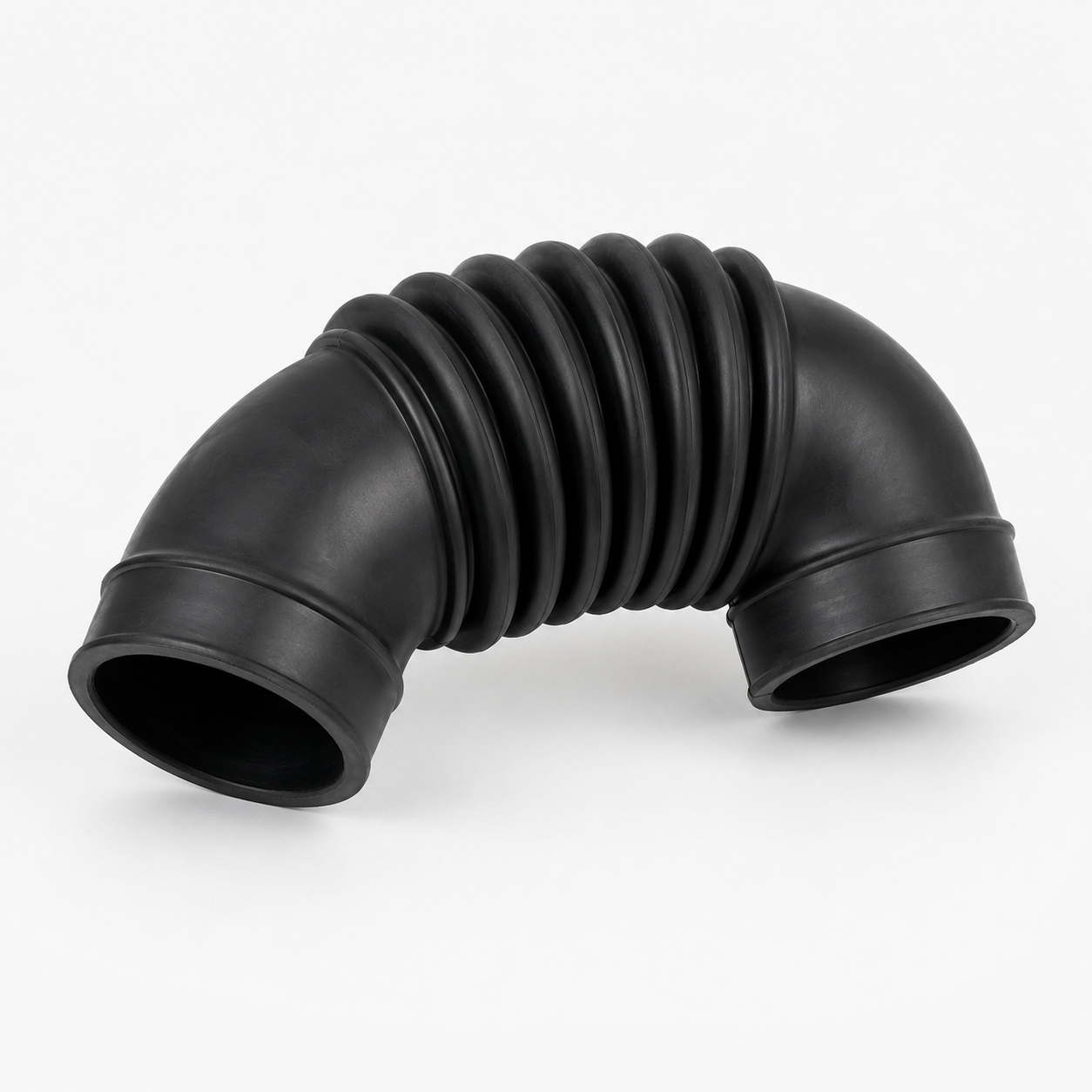 Generic automotive air intake hose on a clean studio background