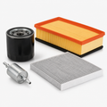 Generic automotive service filter kit on a clean studio background